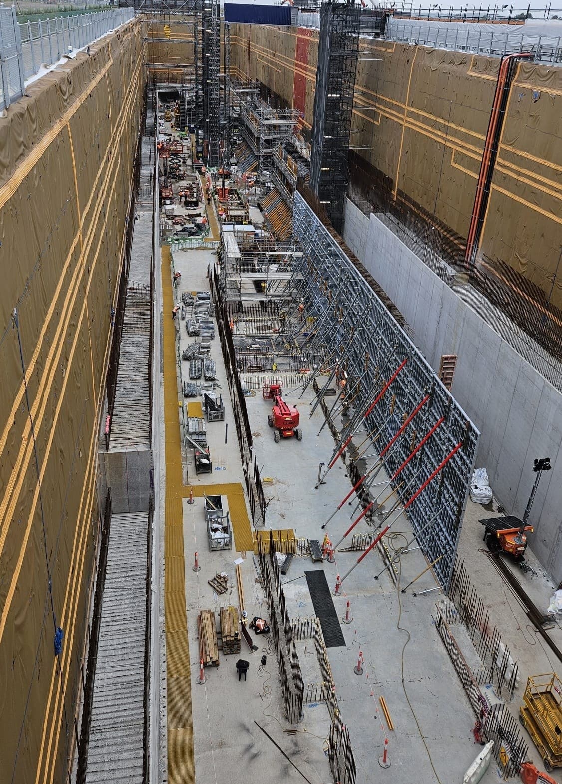 The ATL Metro station box under construction, seen wide from above the excavation